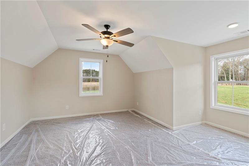 301 Roy Morgan Road Carrollton, GA 30116 - Photo 29 of 35 a view of a room with a ceiling fan and a window