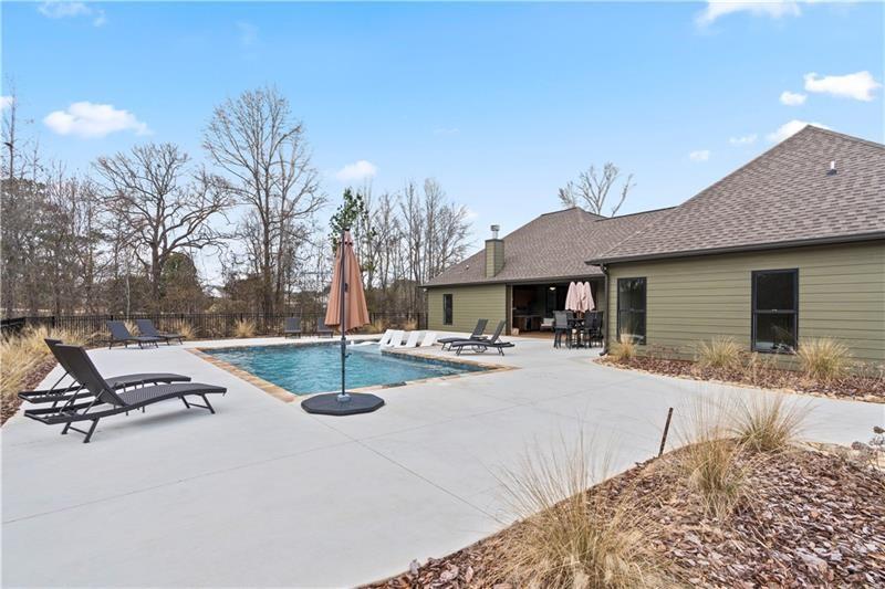 301 Roy Morgan Road Carrollton, GA 30116 - Photo 34 of 35 a view of a backyard with sitting area