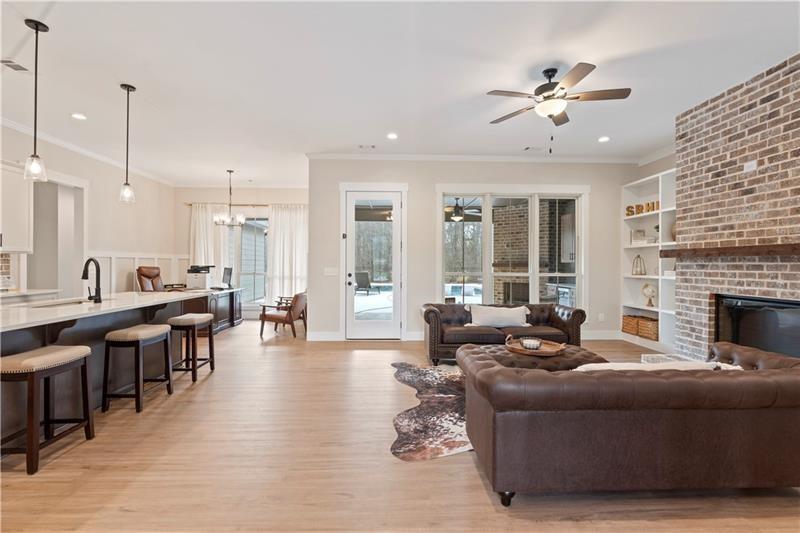 301 Roy Morgan Road Carrollton, GA 30116 - Photo 6 of 35 a living room with furniture and wooden floor
