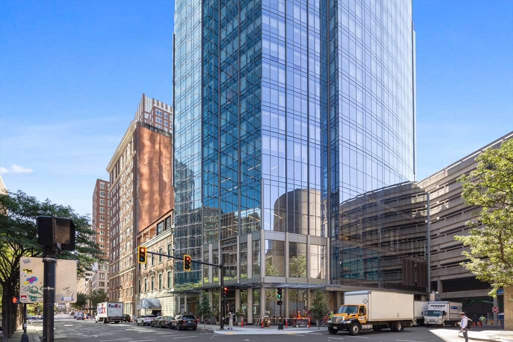 40 Trinity Place, Unit 1503 Boston, MA 02116 - Photo 8 of 14 a city street lined with tall buildings