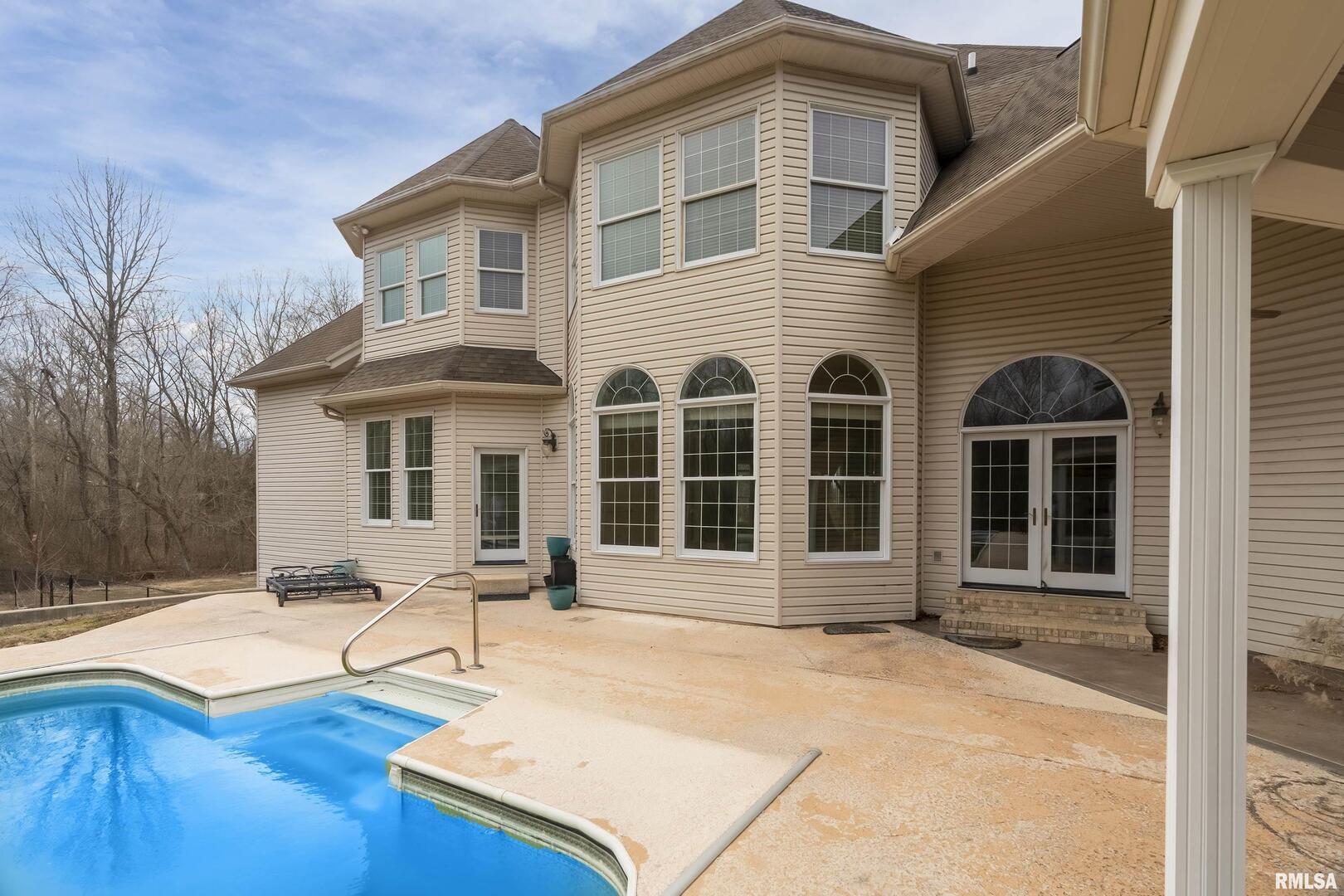 3115 West Striegel Road Carbondale, IL 62901 - Photo 17 of 54 a front view of a house with a patio