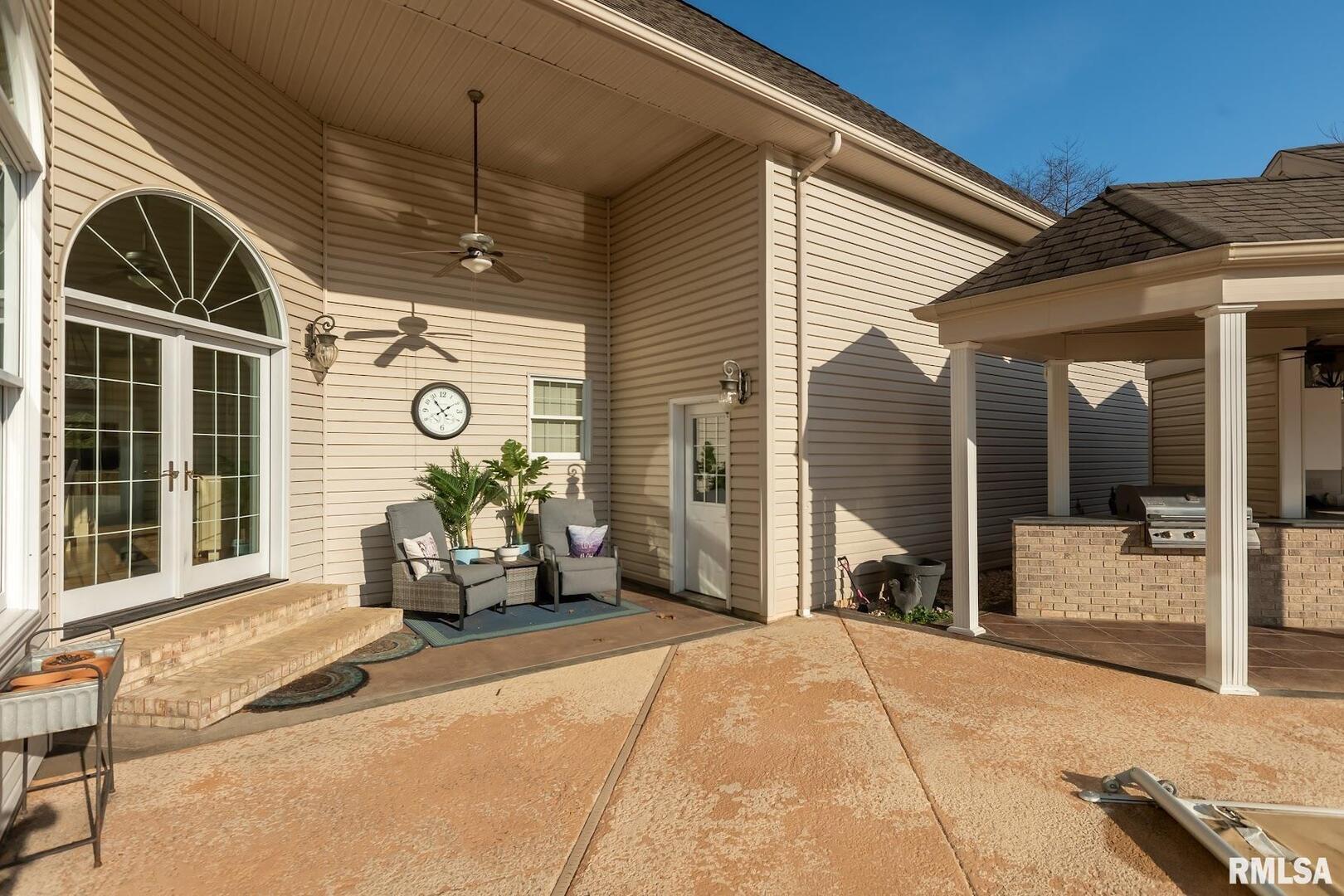 3115 West Striegel Road Carbondale, IL 62901 - Photo 18 of 54 a front view of a house with outdoor seating