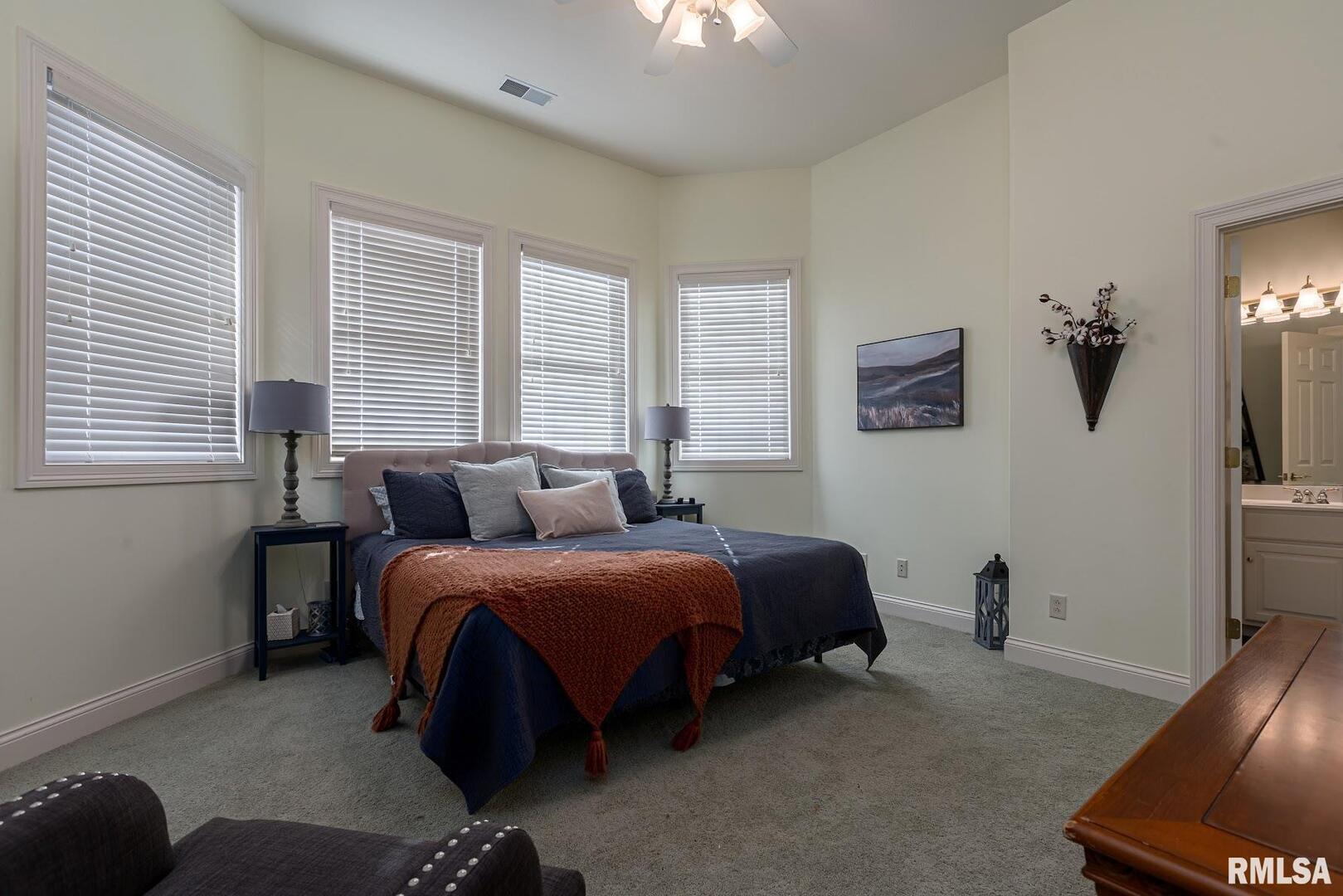 3115 West Striegel Road Carbondale, IL 62901 - Photo 35 of 54 a bed room with a bed and a couch