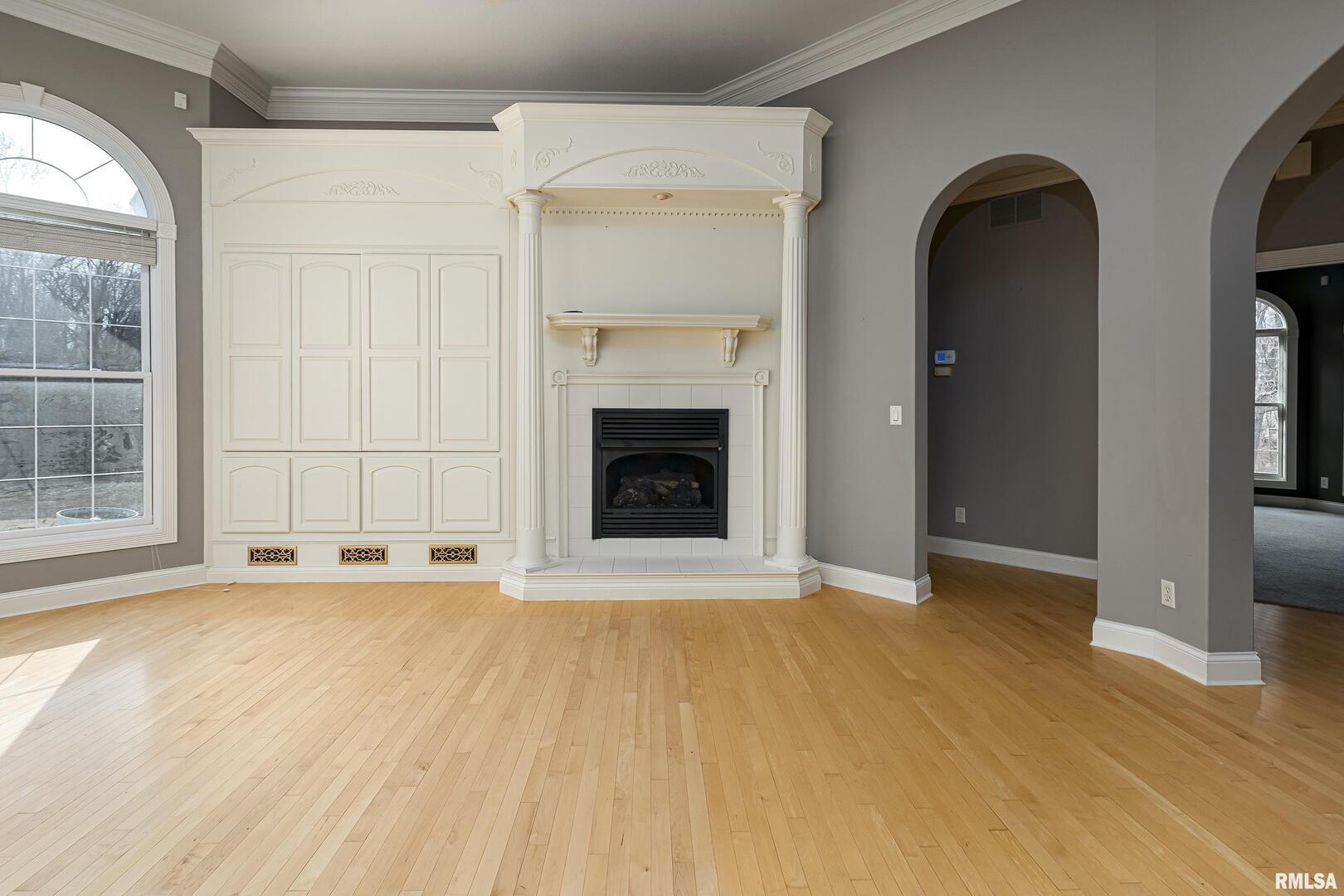 3115 West Striegel Road Carbondale, IL 62901 - Photo 40 of 54 a view of an empty room with a fireplace and a window