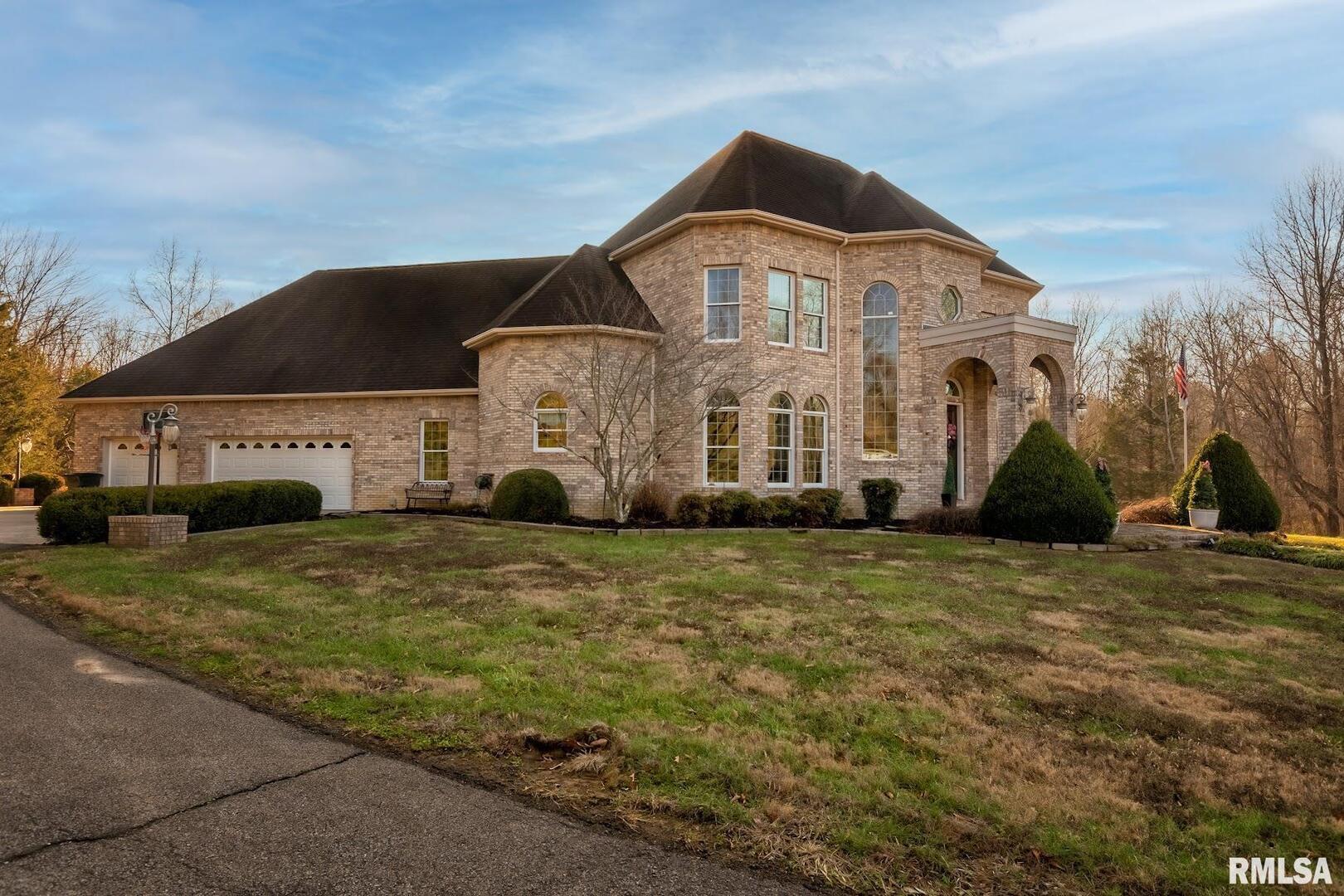 3115 West Striegel Road Carbondale, IL 62901 - Photo 44 of 54 a front view of a house with a yard