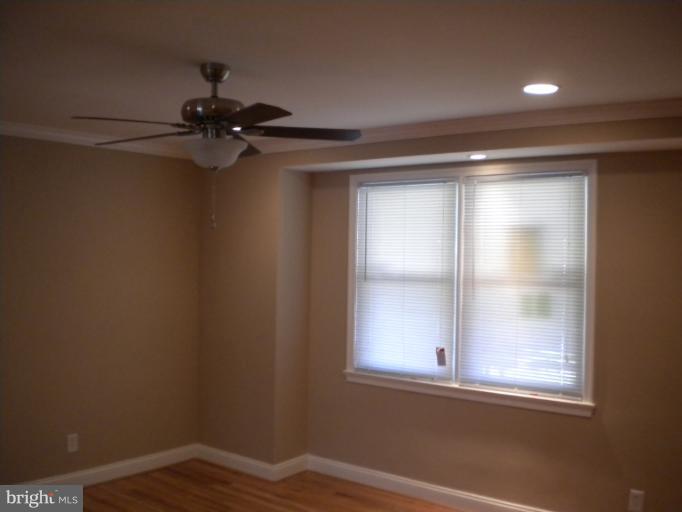 812 Wicklow Road Baltimore, MD 21229 - Photo 24 of 30 a view of empty room with window