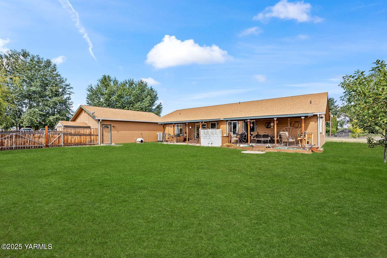 1880 Dilley Road Tieton, WA 98947 - Photo 36 of 45 a view of an house with backyard space and balcony