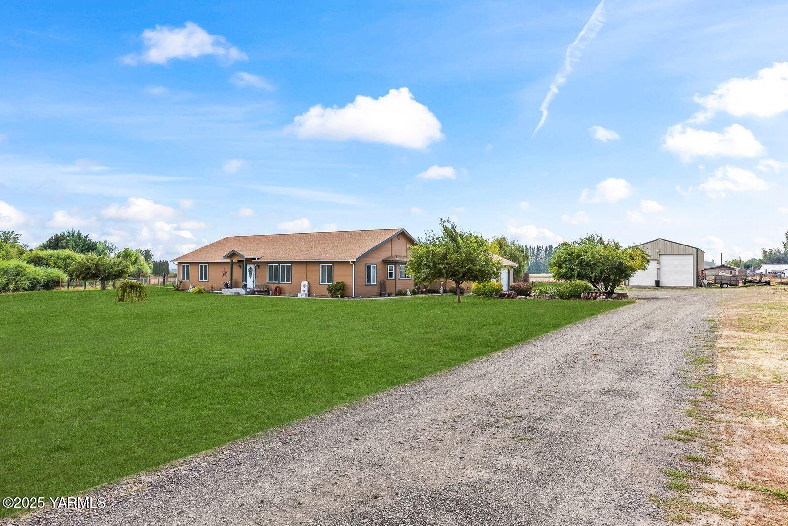 1880 Dilley Road Tieton, WA 98947 - Photo 4 of 45 a view of a street with a building in the background