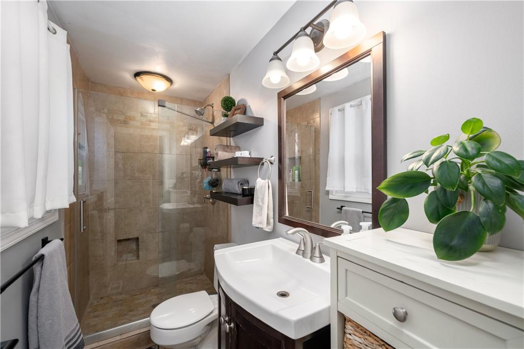 110 Avon Drive Butler, PA 16001 - Photo 20 of 35 a bathroom with a sink a toilet and shower