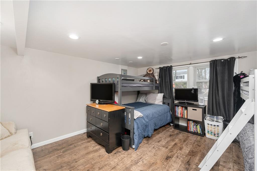 110 Avon Drive Butler, PA 16001 - Photo 23 of 35 a bedroom with a bed and a flat screen tv