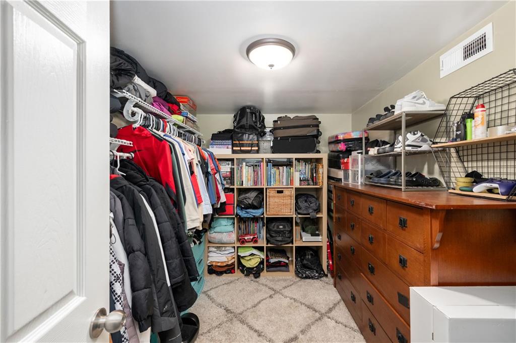 110 Avon Drive Butler, PA 16001 - Photo 27 of 35 a view of walk in closet with clothes and shoes