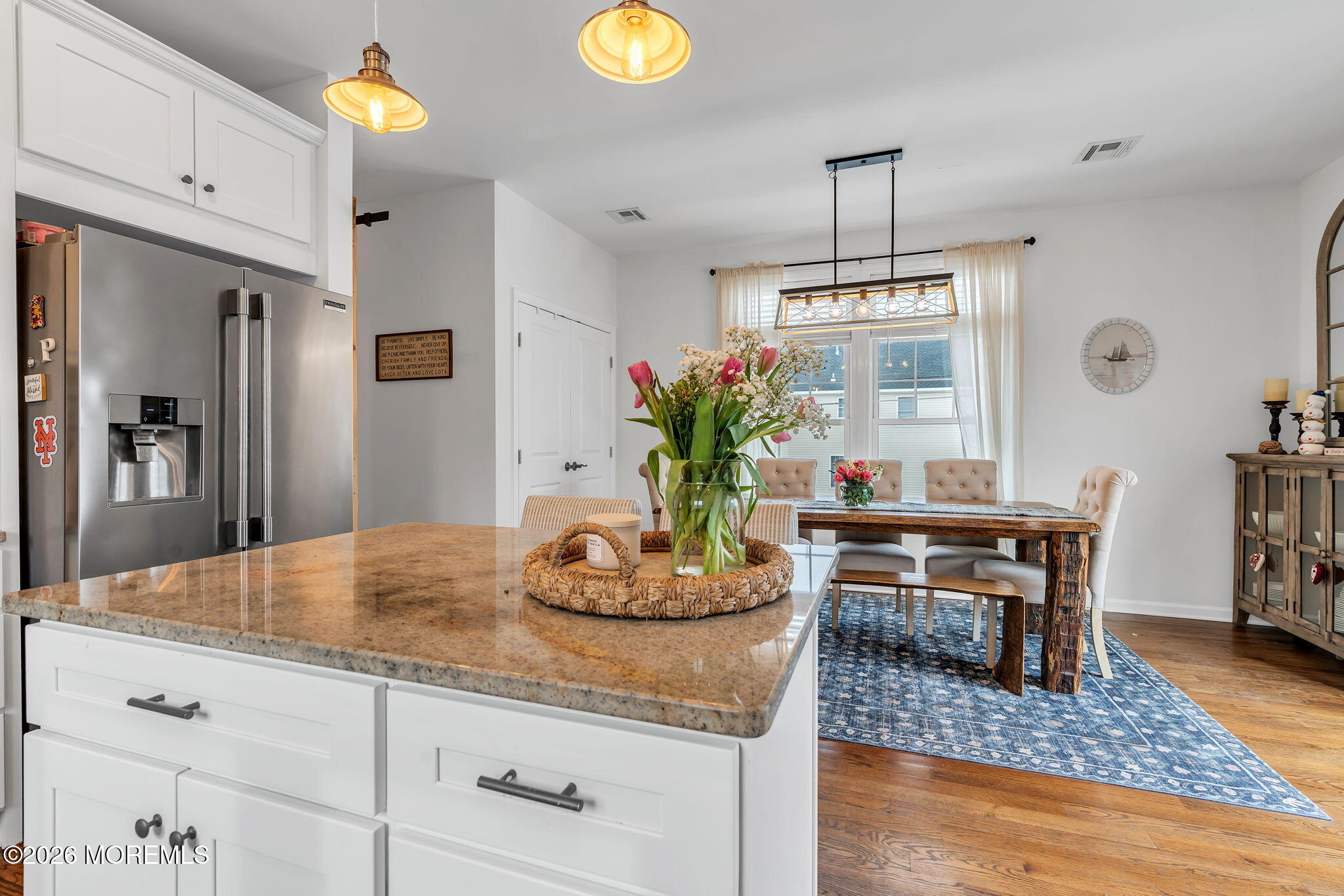 1202 High Avenue Union Beach, NJ 07735 - Photo 20 of 44 a kitchen with a table and chairs in it
