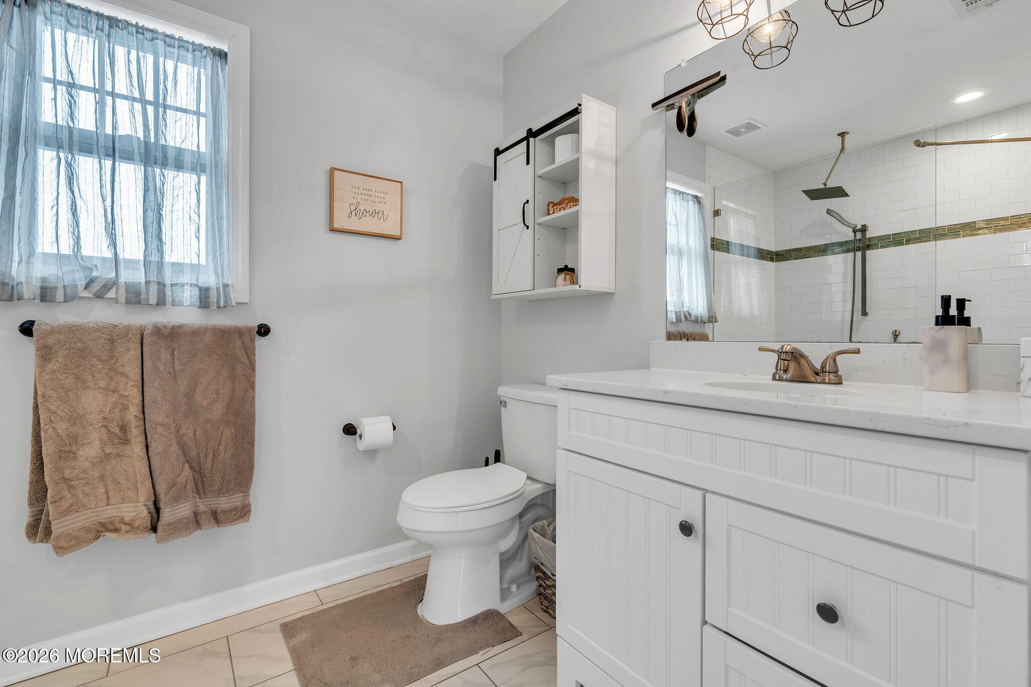 1202 High Avenue Union Beach, NJ 07735 - Photo 32 of 44 a bathroom with a sink toilet and vanity