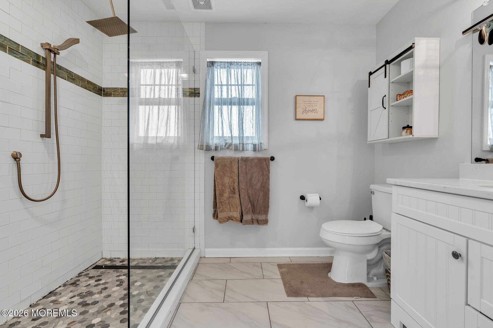 1202 High Avenue Union Beach, NJ 07735 - Photo 34 of 44 a bathroom with a toilet a sink and shower