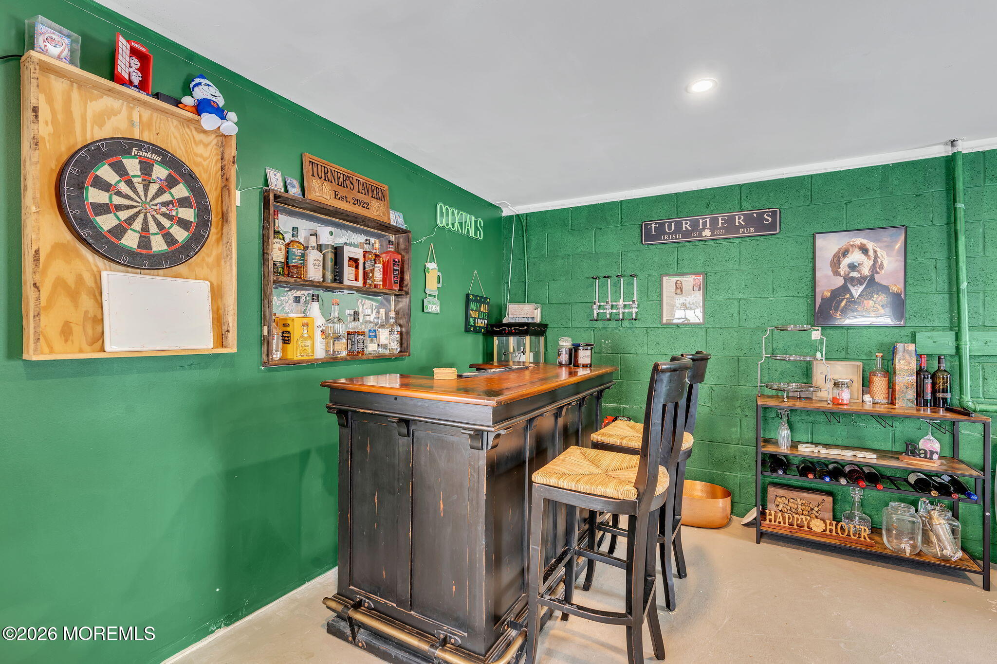 1202 High Avenue Union Beach, NJ 07735 - Photo 36 of 44 a room with furniture and a clock