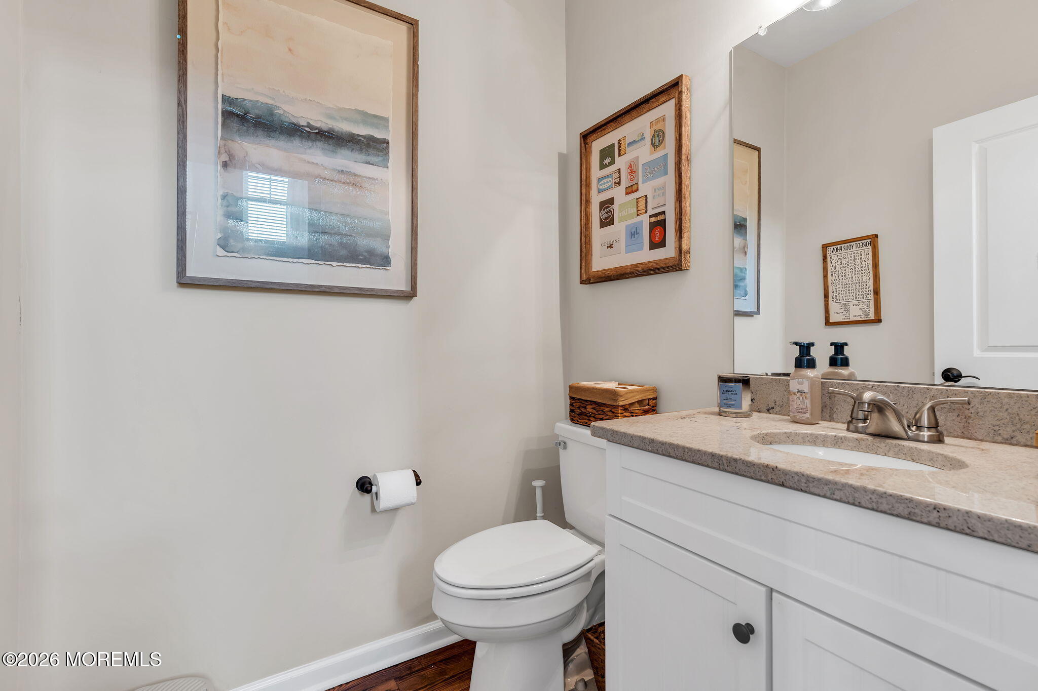 1202 High Avenue Union Beach, NJ 07735 - Photo 9 of 44 a bathroom with a granite countertop toilet sink and mirror