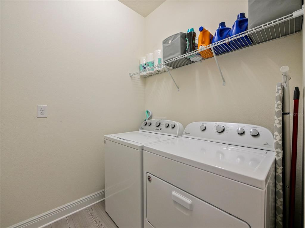 4553 Baler Trails Drive St. Cloud, FL 34772 - Photo 22 of 32 a utility room with dryer and washer