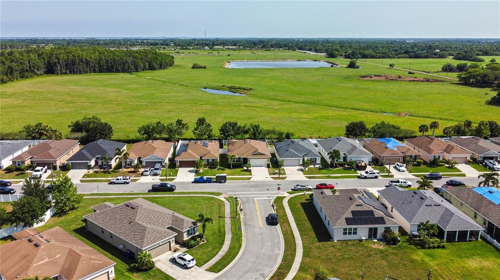4553 Baler Trails Drive St. Cloud, FL 34772 - Photo 29 of 32 a view of an ocean with outdoor space