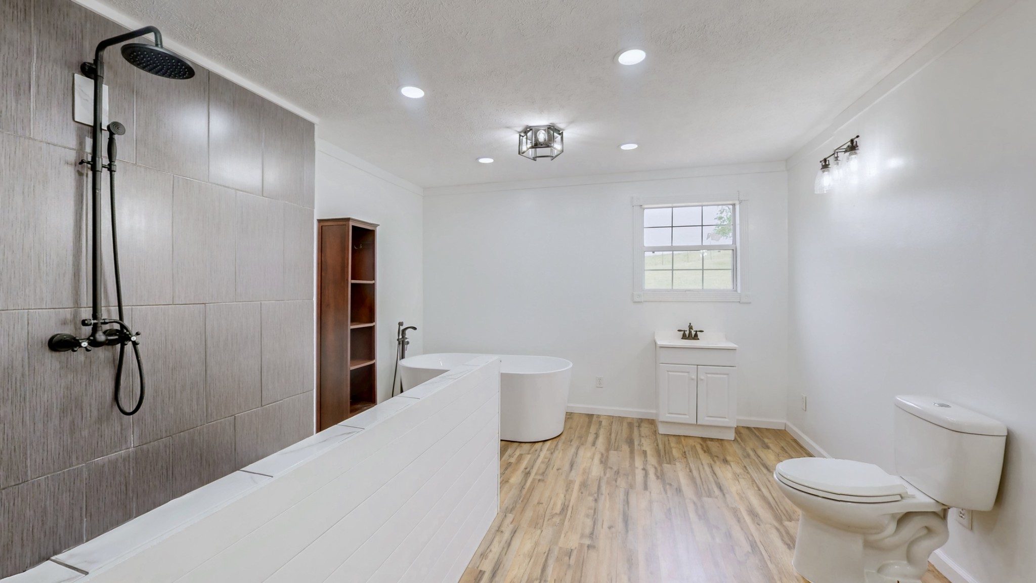 75 Vantrease Road Brush Creek, TN 38547 - Photo 20 of 72 a bathroom with a toilet sink and shower