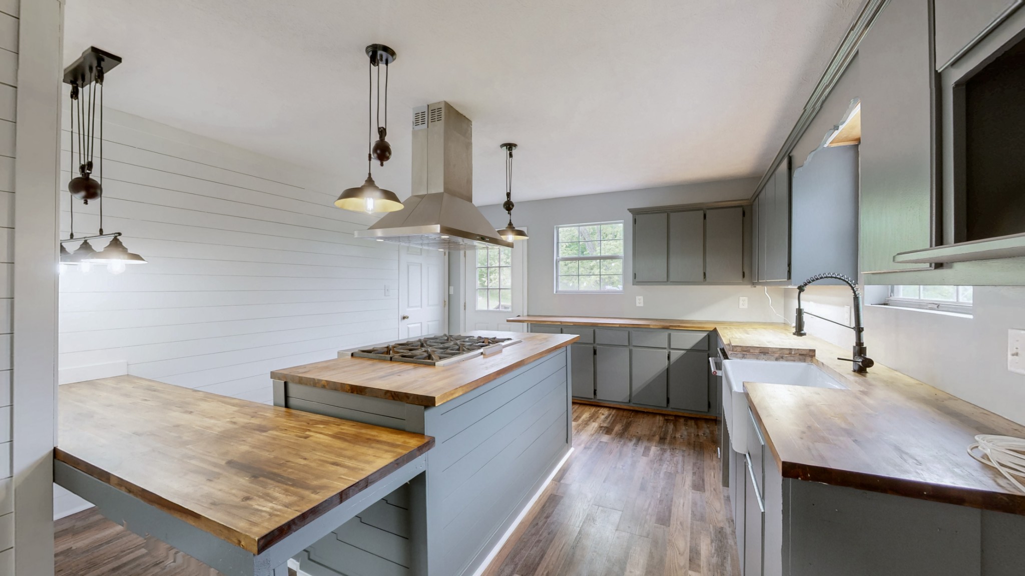 75 Vantrease Road Brush Creek, TN 38547 - Photo 6 of 34 a kitchen with a stove a sink and a refrigerator