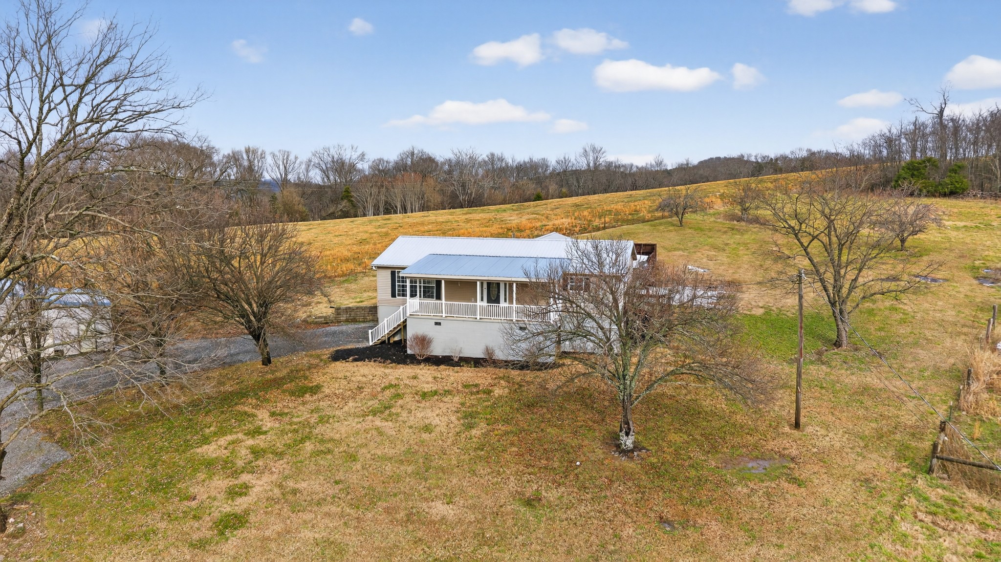 75 Vantrease Road Brush Creek, TN 38547 - Photo 61 of 72 a view of a terrace with a lake and mountain view