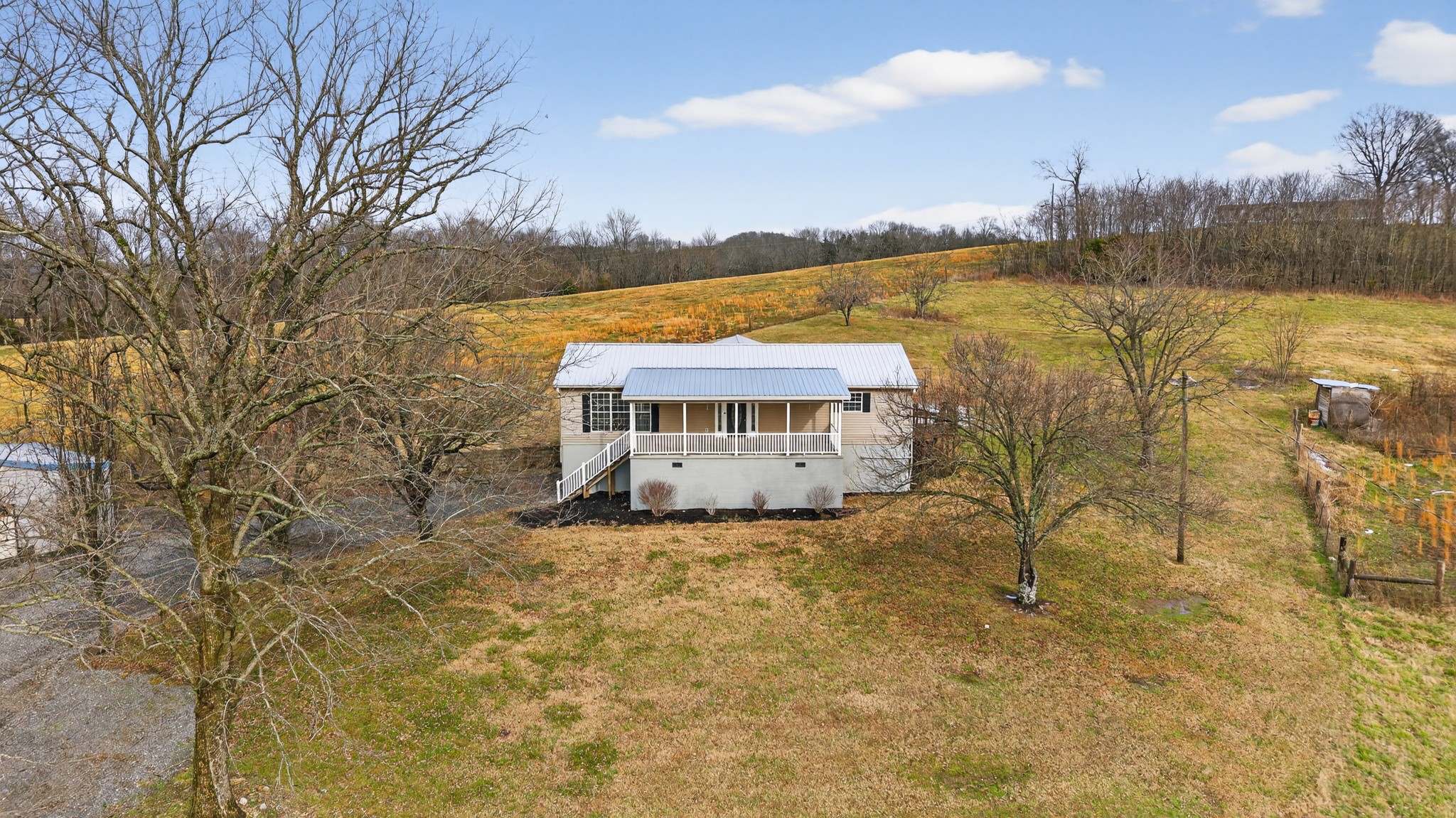 75 Vantrease Road Brush Creek, TN 38547 - Photo 62 of 72 a view of a lake with a mountain in the background