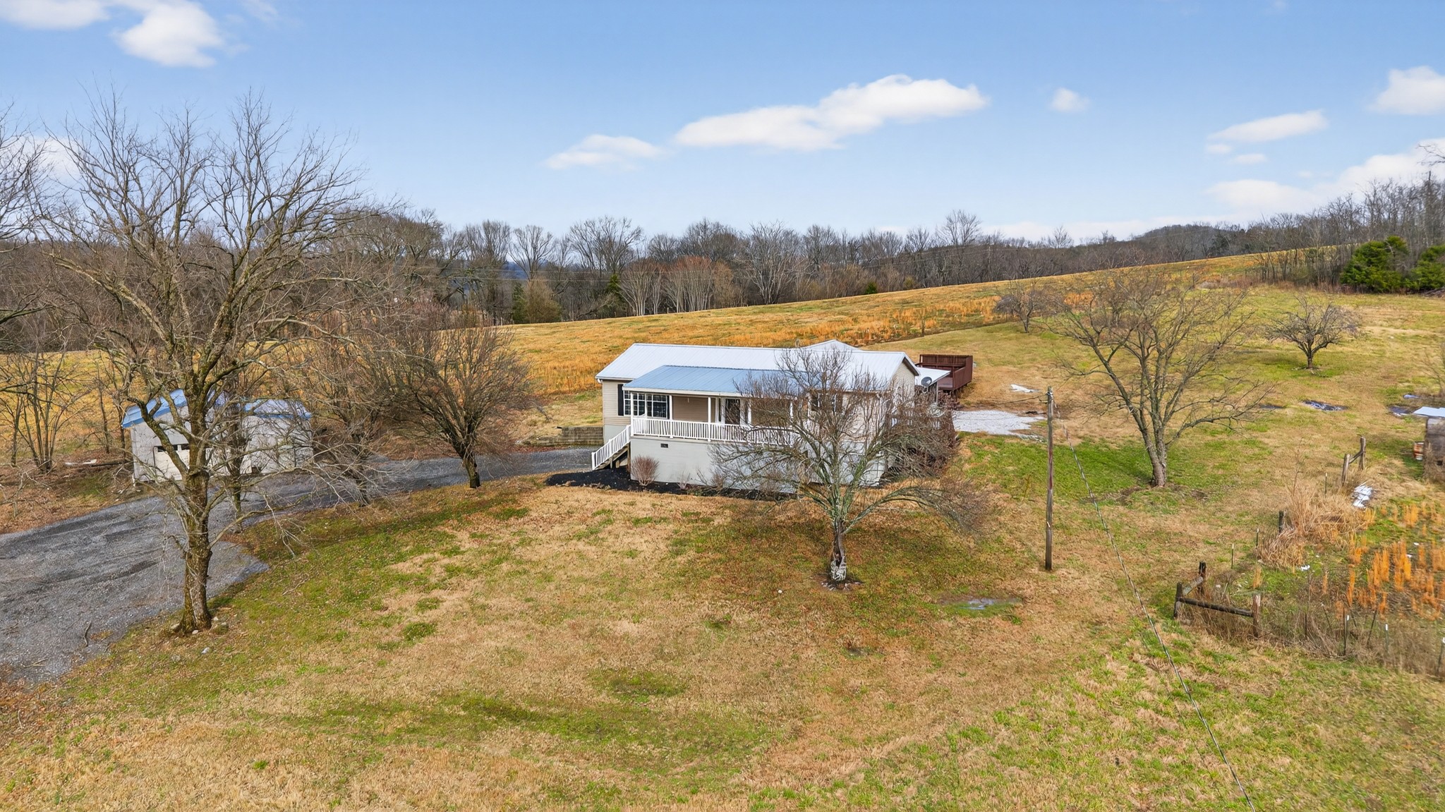 75 Vantrease Road Brush Creek, TN 38547 - Photo 63 of 72 a view of a house with a yard and mountain view