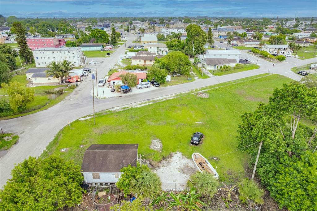 601 Southwest 6th Street Belle Glade, FL 33430 - Photo 5 of 7 an aerial view of a residential houses with outdoor space