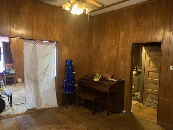 a room with a table and chairs