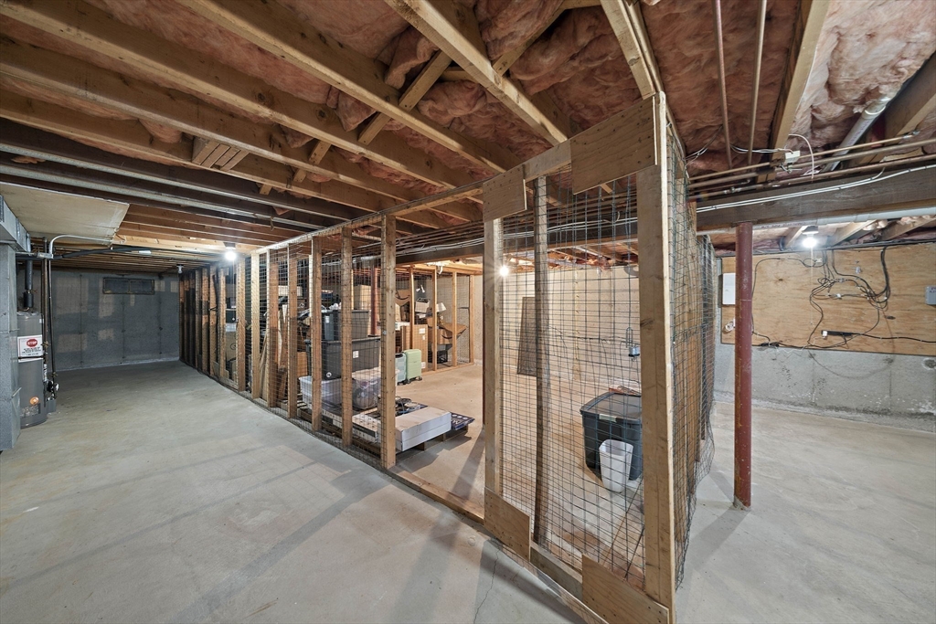 22 Union Square, Unit 22 Randolph, MA 02368 - Photo 25 of 28 a view of an empty room with wooden walls
