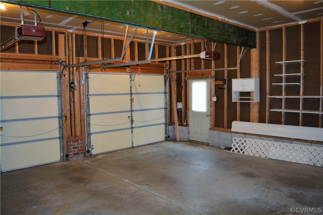 5437 Hackney Road Richmond, VA 23234 - Photo 18 of 50 a view of a house with a garage