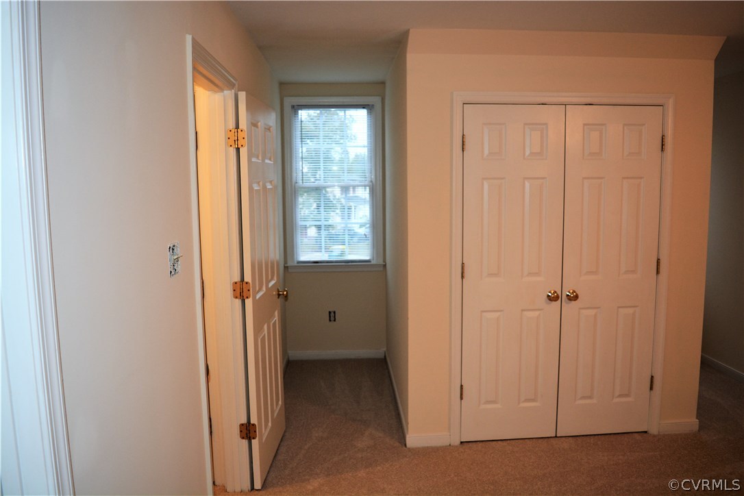 5437 Hackney Road Richmond, VA 23234 - Photo 47 of 50 an empty room with windows and closet