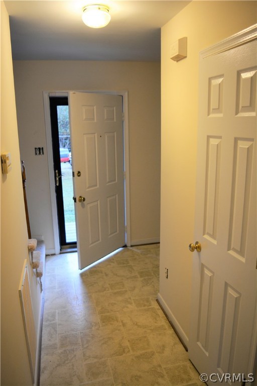 5437 Hackney Road Richmond, VA 23234 - Photo 5 of 50 a view of a hallway with wooden floor and closet