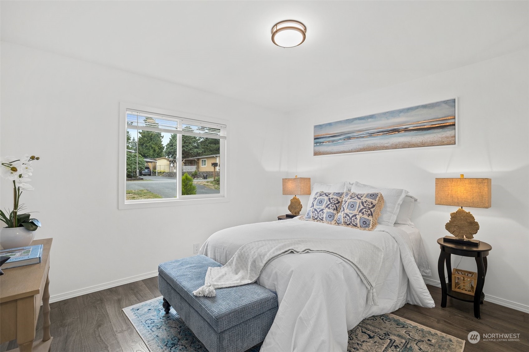 12031 2nd Drive Southeast Everett, WA 98208 - Photo 18 of 27 a bedroom with a bed and wooden floor