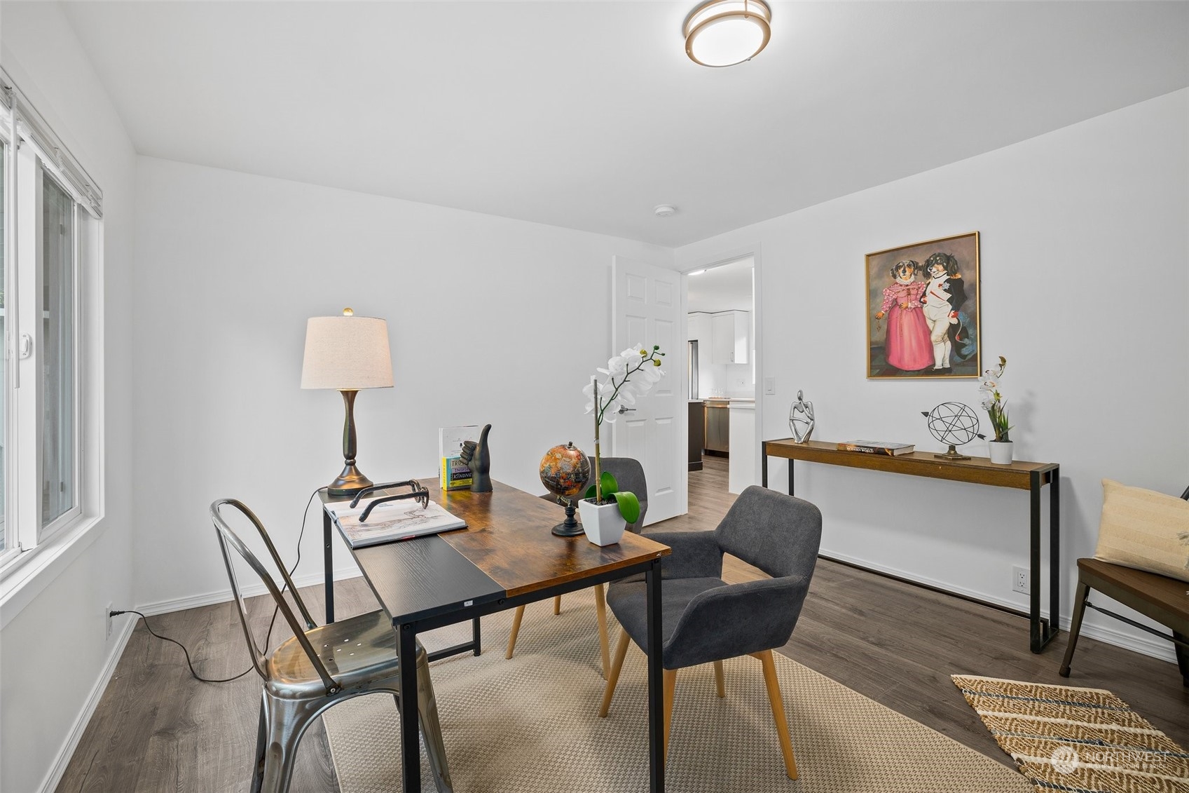 12031 2nd Drive Southeast Everett, WA 98208 - Photo 21 of 27 a view of a dining room with furniture and wooden floor