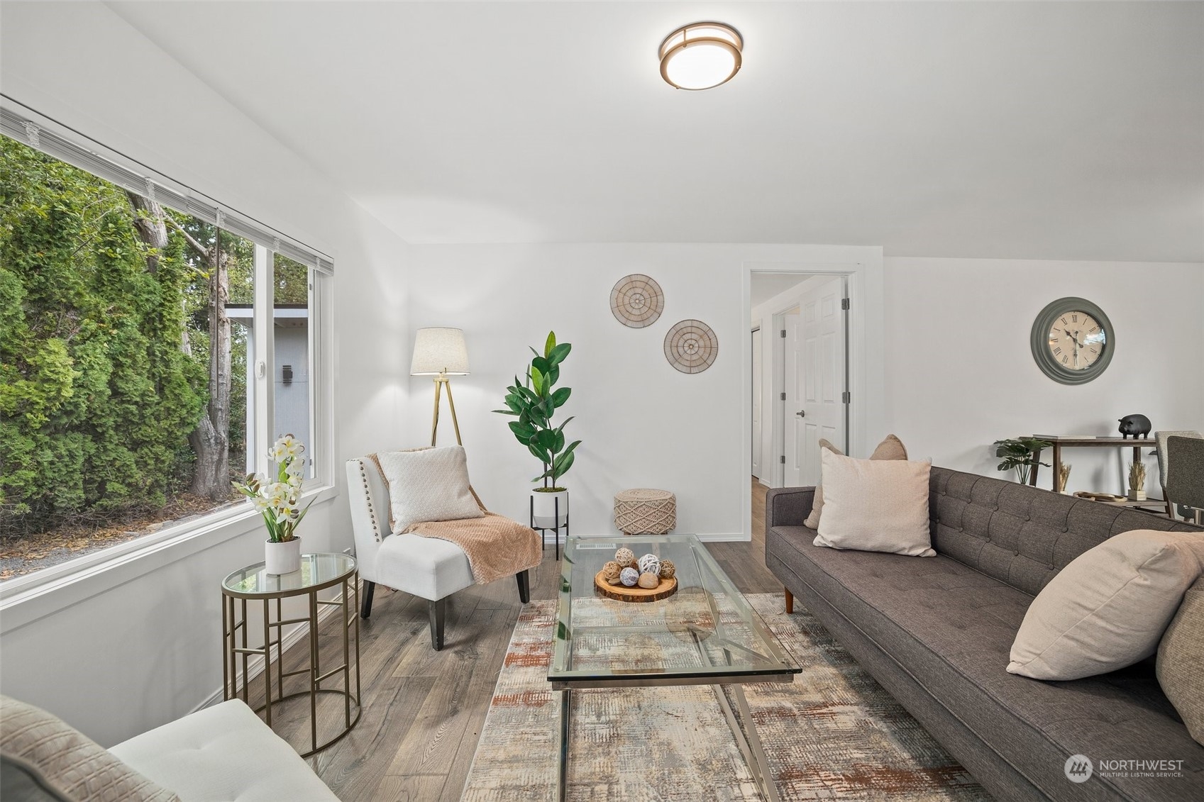12031 2nd Drive Southeast Everett, WA 98208 - Photo 7 of 27 a living room with furniture and wooden floor