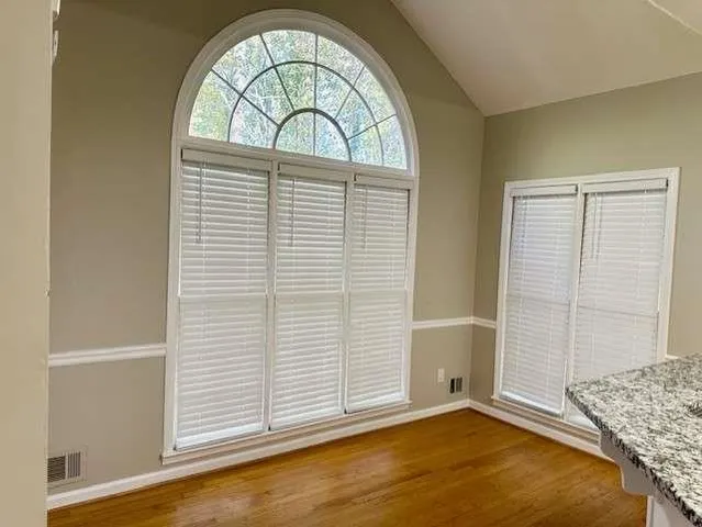 an empty room with window