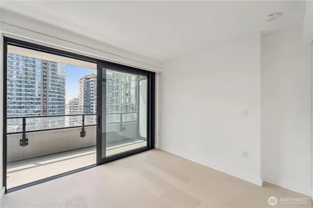 a view of an empty room with a window