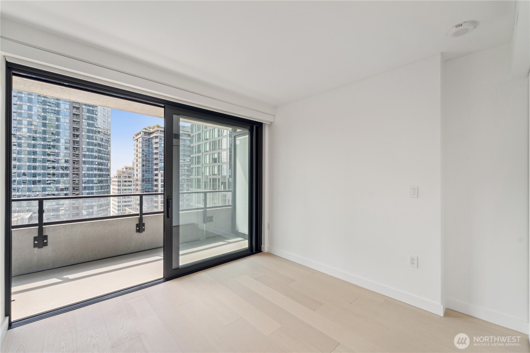 300 Virginia Street, Unit 1411 Seattle, WA 98121 - Photo 18 of 38 a view of an empty room with a window