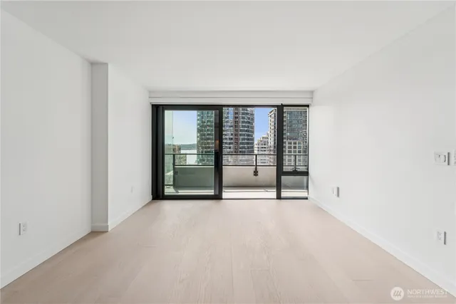 a view of an empty room with a window