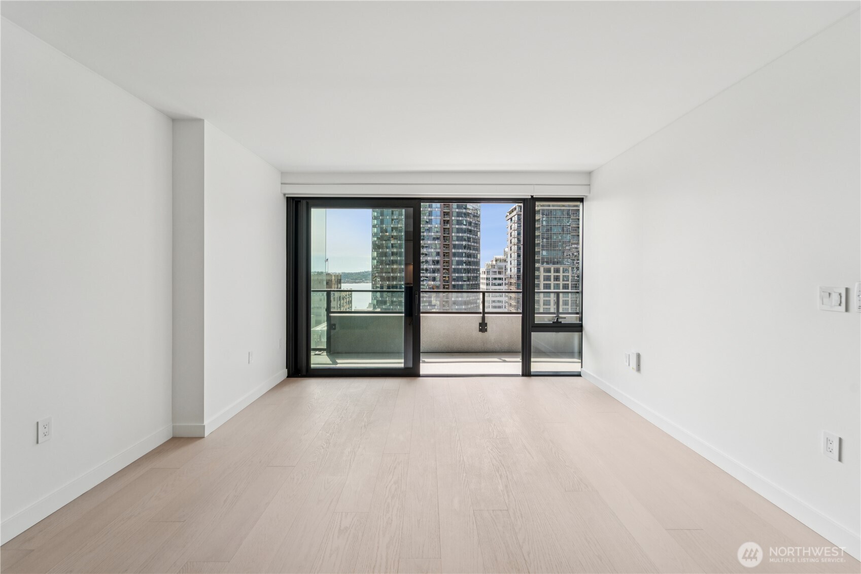300 Virginia Street, Unit 1411 Seattle, WA 98121 - Photo 4 of 38 a view of an empty room with a window