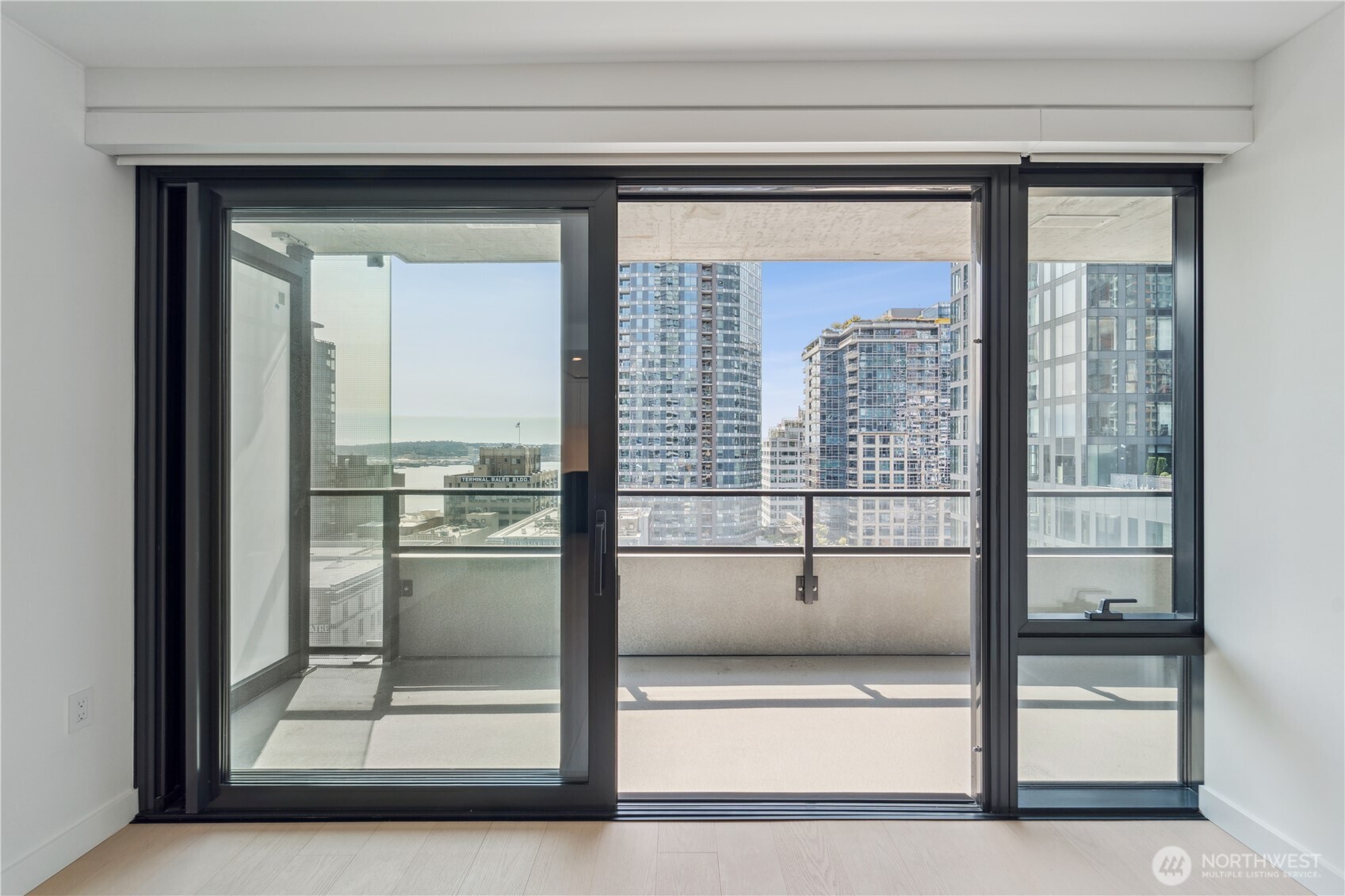 300 Virginia Street, Unit 1411 Seattle, WA 98121 - Photo 5 of 38 a view of a glass door