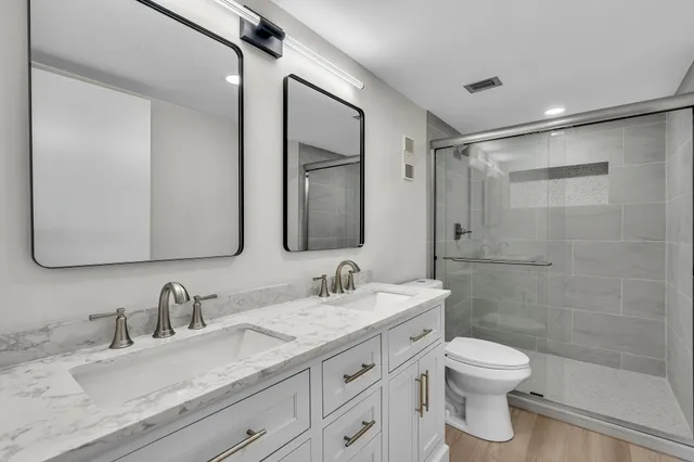 a view of entryway and hall with a sink