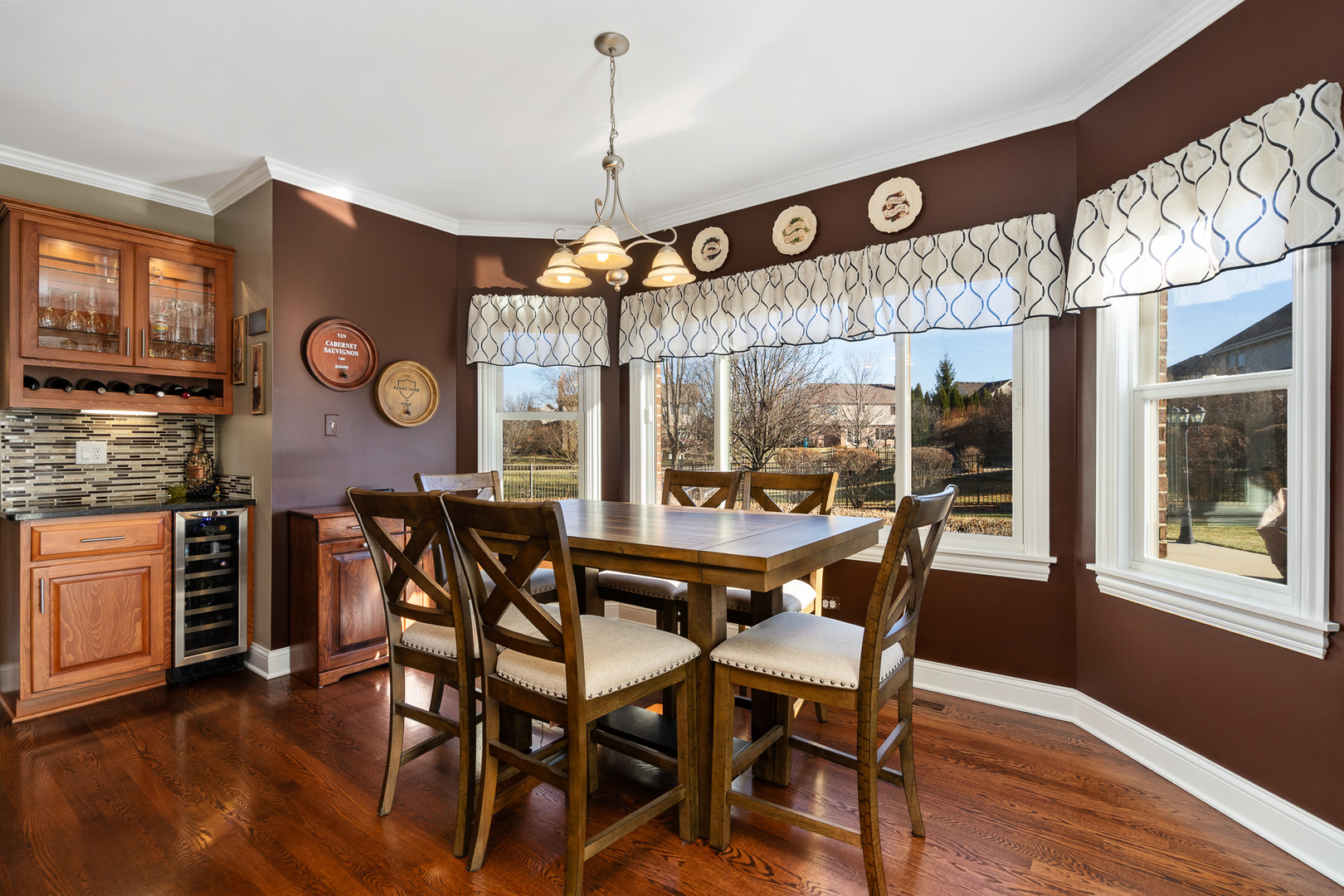 17621 Harper Road Tinley Park, IL 60487 - Photo 14 of 67 a view of a dining area with furniture and chandelier