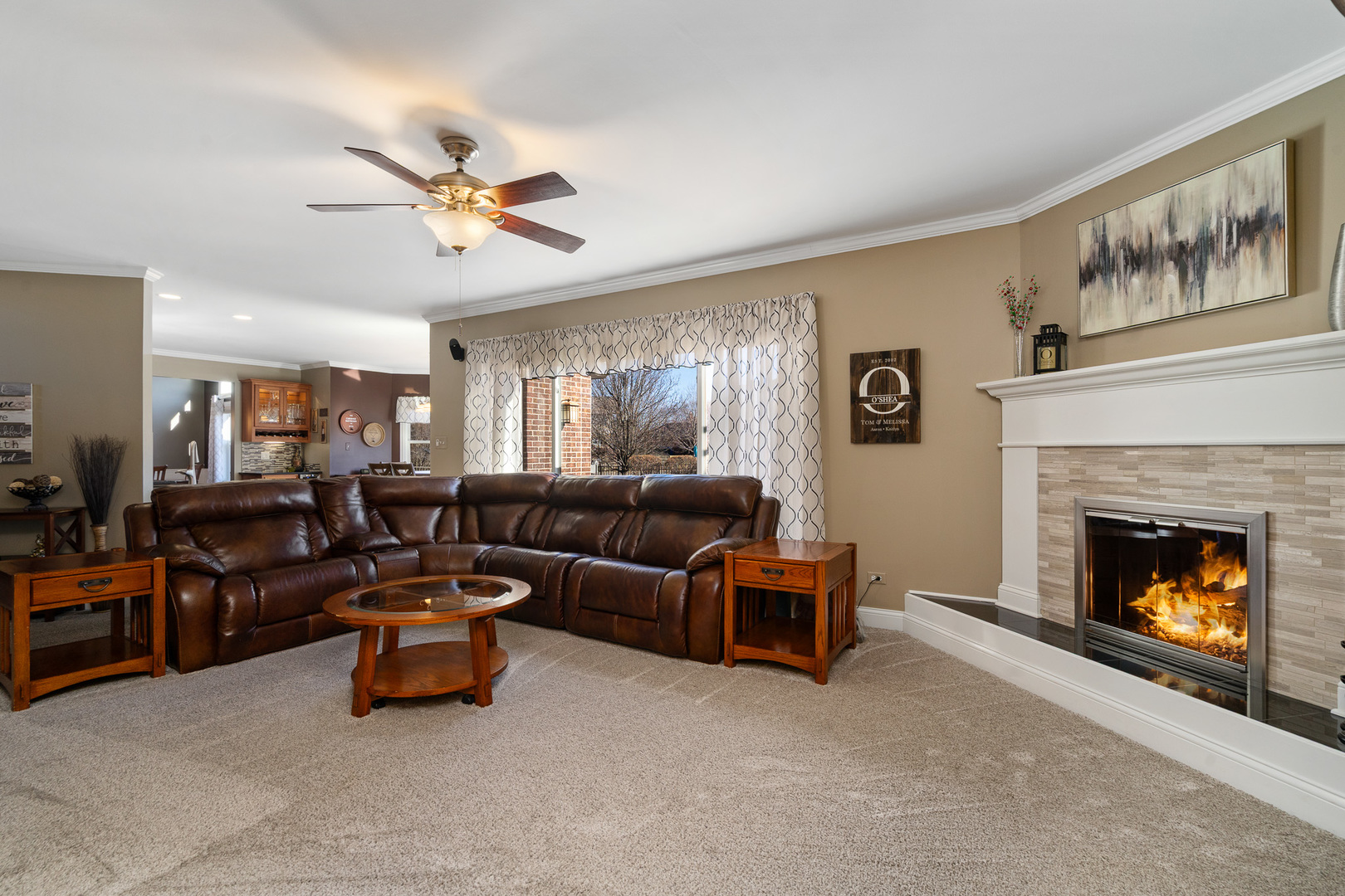 17621 Harper Road Tinley Park, IL 60487 - Photo 16 of 67 a living room with furniture and a fireplace