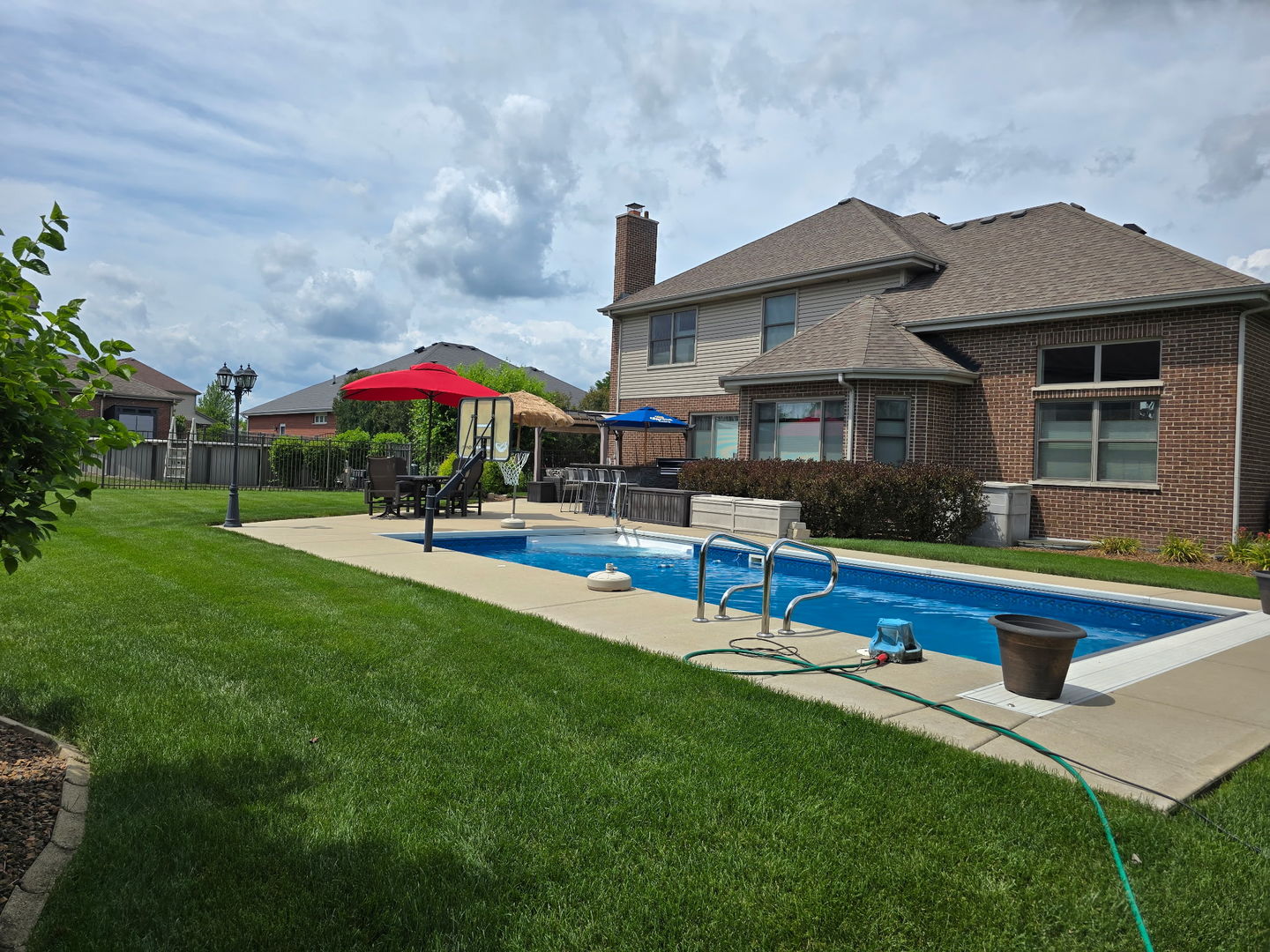 17621 Harper Road Tinley Park, IL 60487 - Photo 2 of 67 a front view of house with yard and outdoor seating