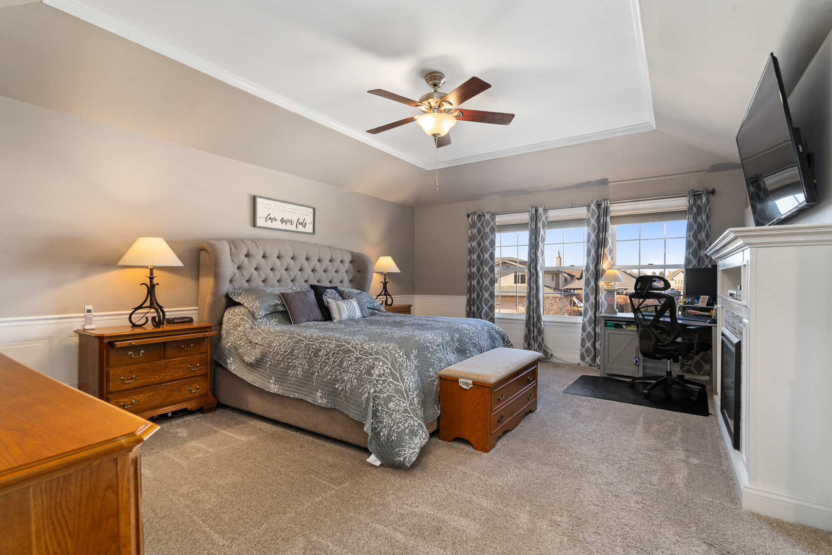 17621 Harper Road Tinley Park, IL 60487 - Photo 22 of 67 a bed room with furniture and a flat screen tv