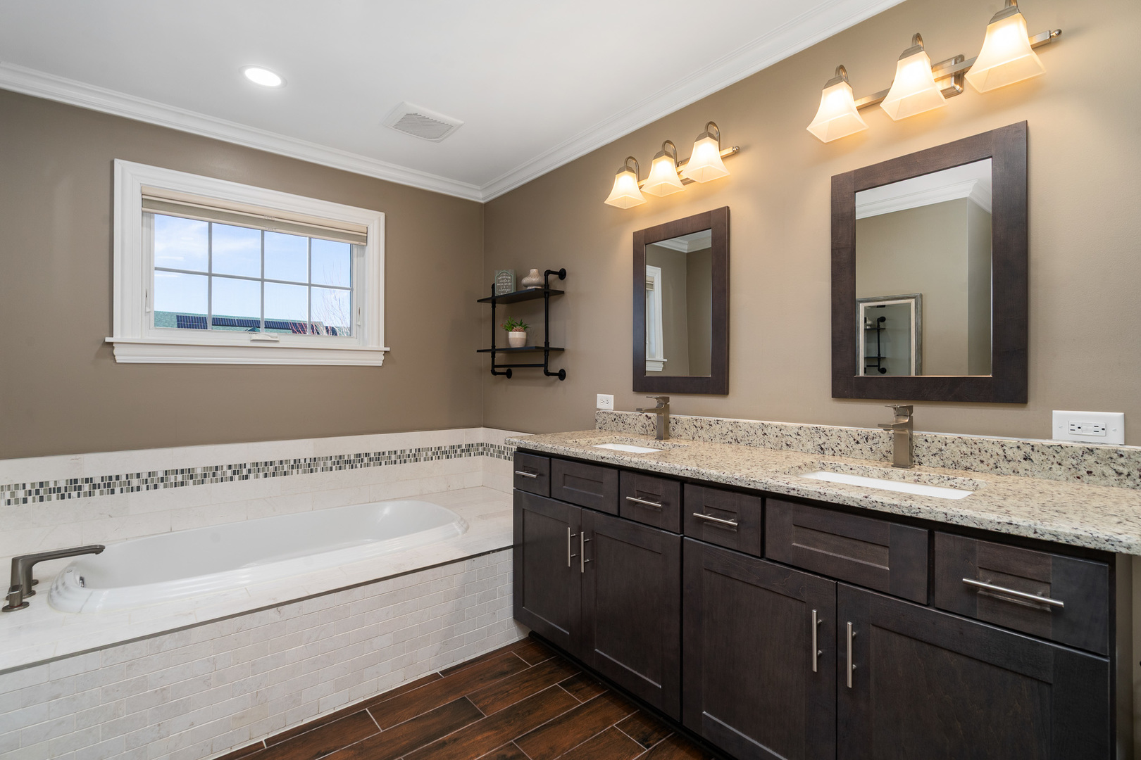 17621 Harper Road Tinley Park, IL 60487 - Photo 24 of 67 a bathroom with a tub a sink and mirror