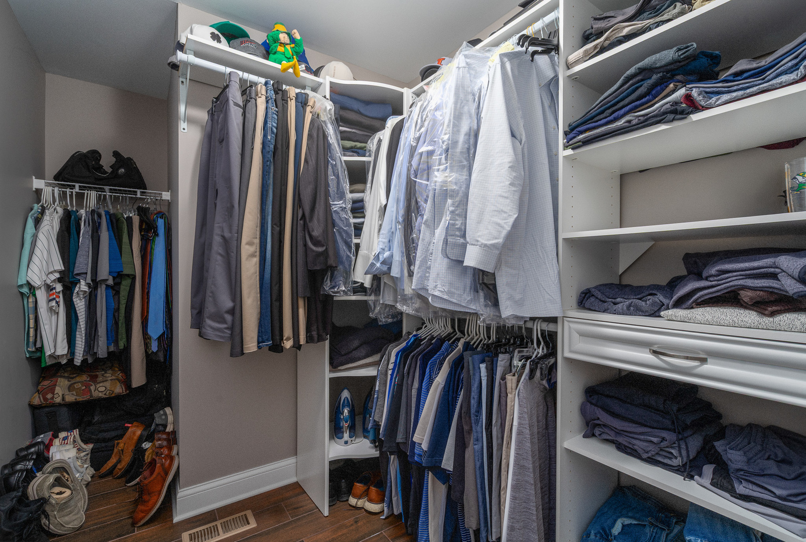 17621 Harper Road Tinley Park, IL 60487 - Photo 27 of 67 a view of walk in closet with clothes and shoes