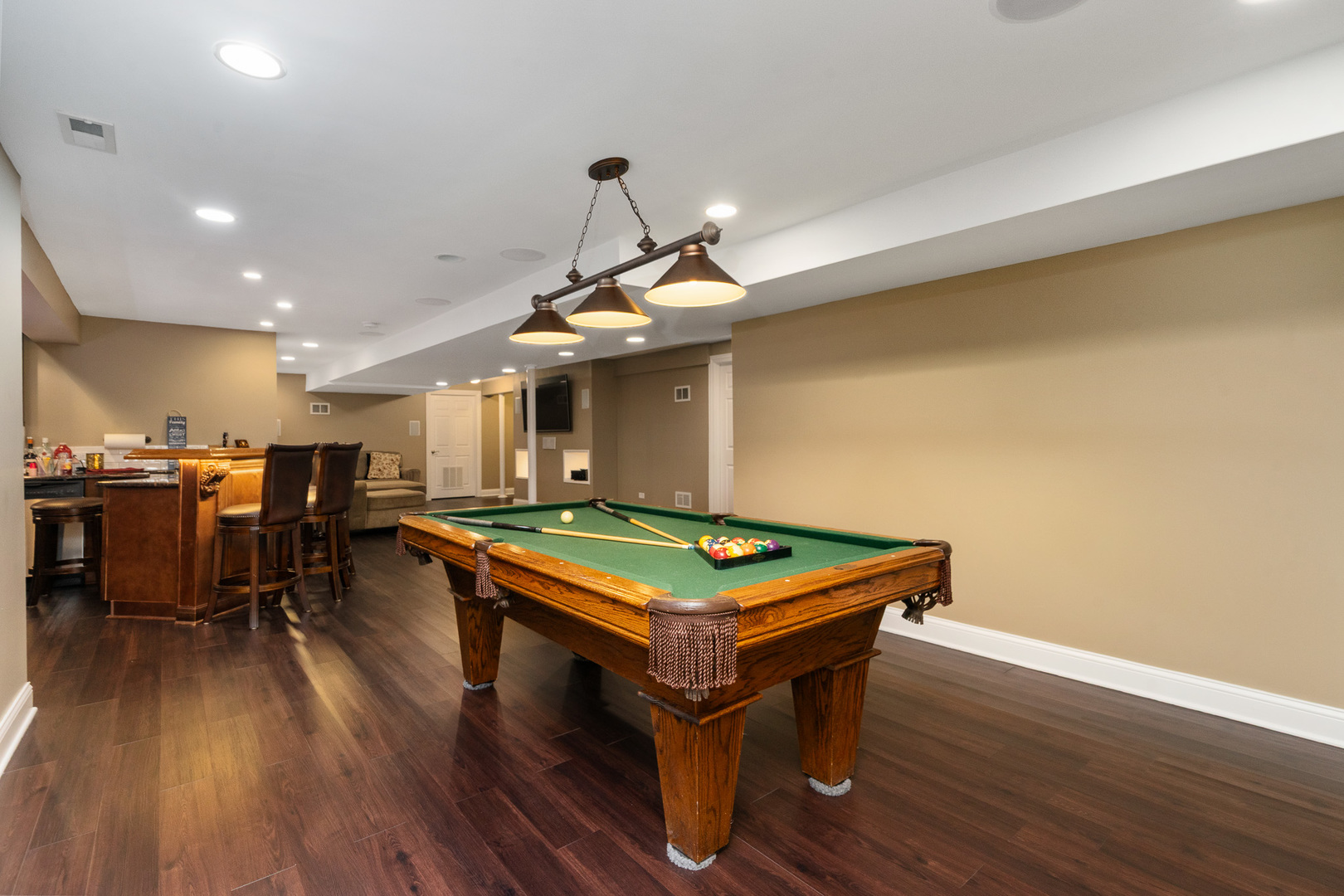 17621 Harper Road Tinley Park, IL 60487 - Photo 38 of 67 a room with wooden floor pool table and chairs